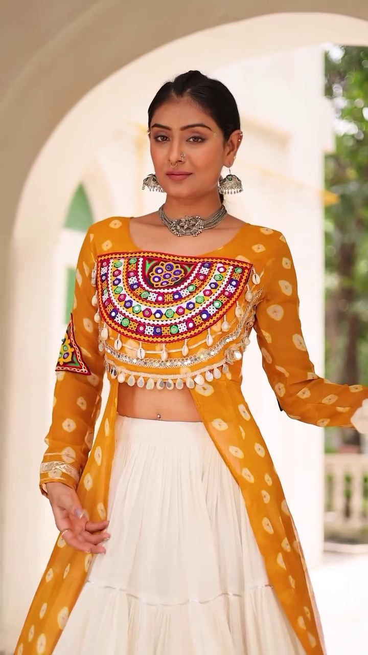 Traditional Kutchi Mirror Work Embroidered Pink Long Jacket with White Flared Lehenga – Navratri & Festive Special Ethnic Wear Set for Women