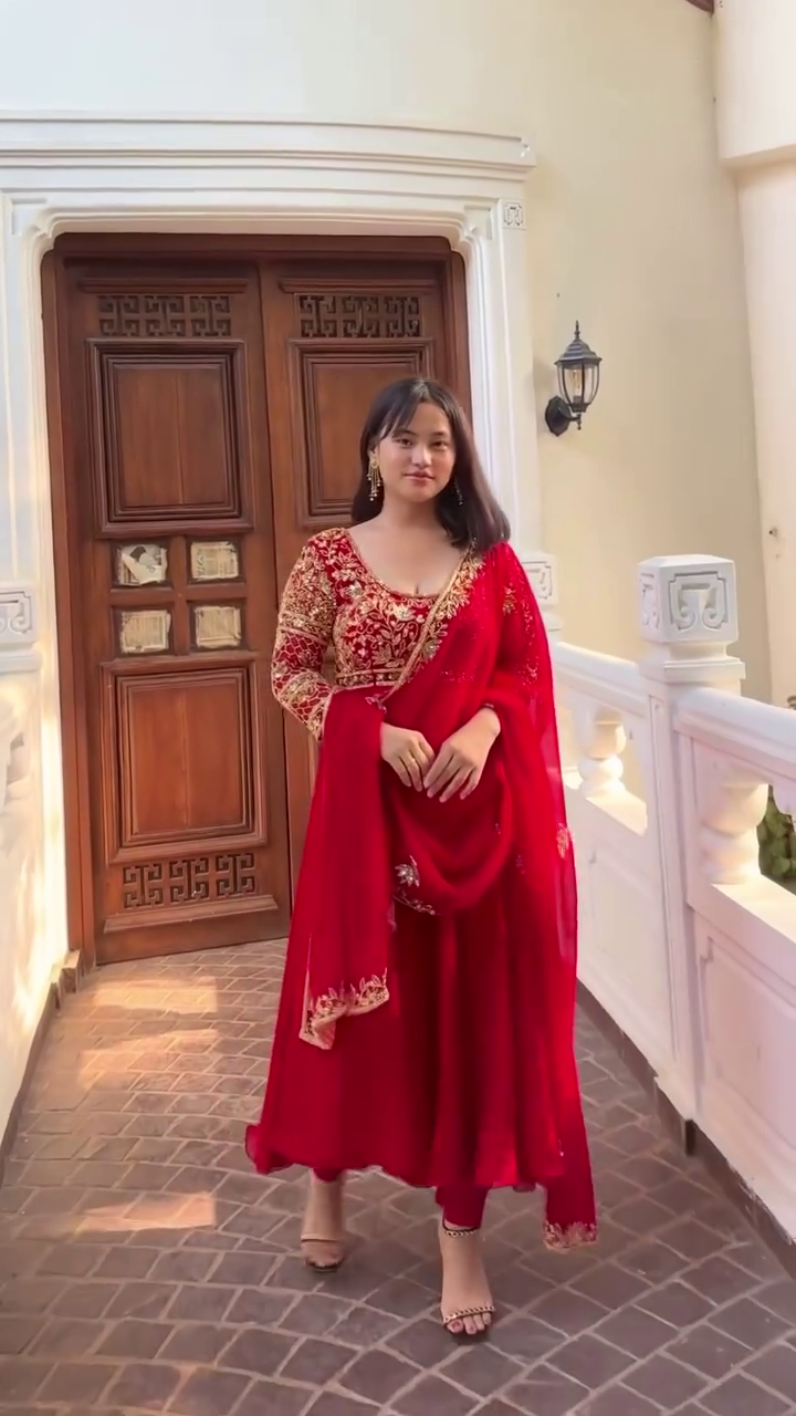 Royal Crimson Elegance – Heavy Embroidered Red Anarkali Gown with Net Dupatta & Golden Zari Detailing for Weddings & Festive Celebrations"