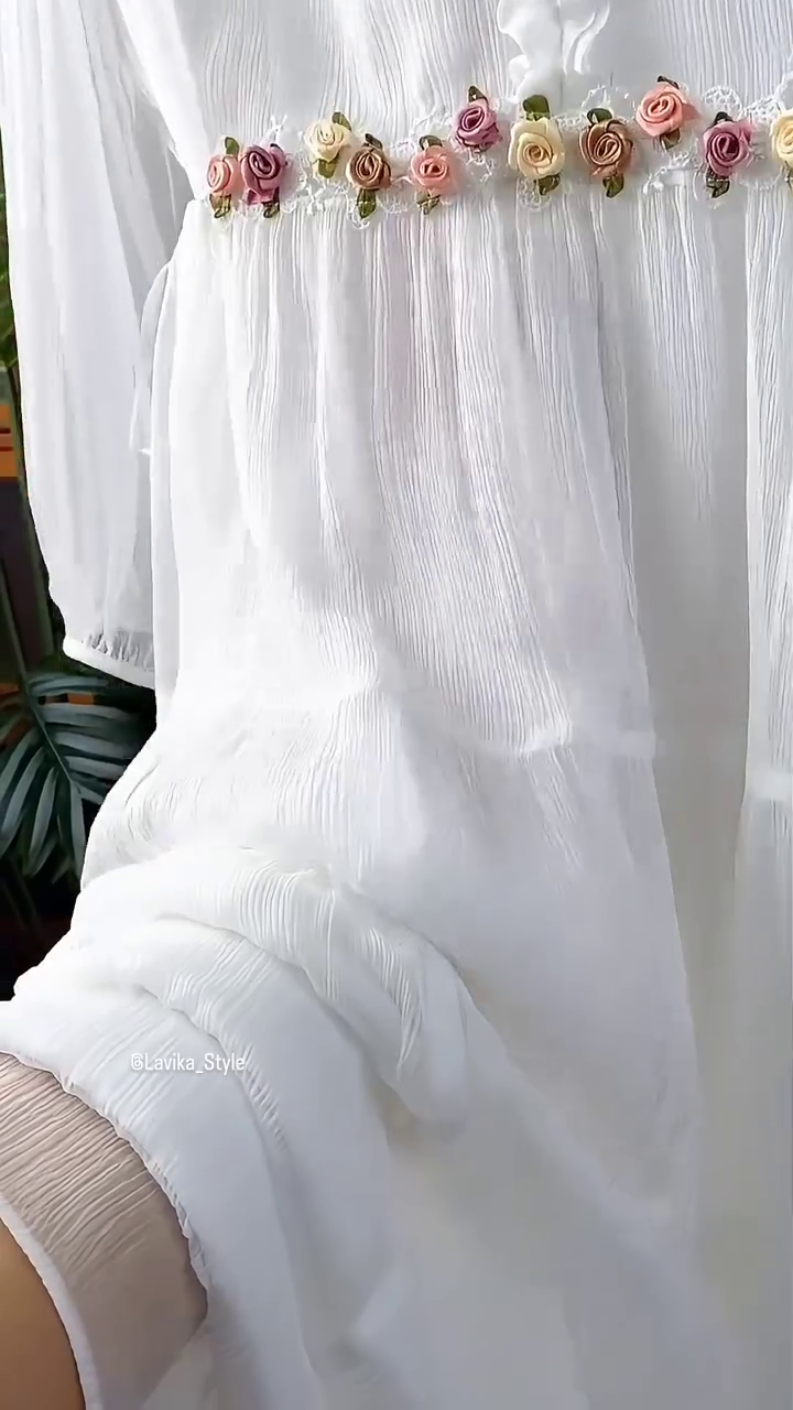 Flowing elegance wrapped in white serenity - Image 5