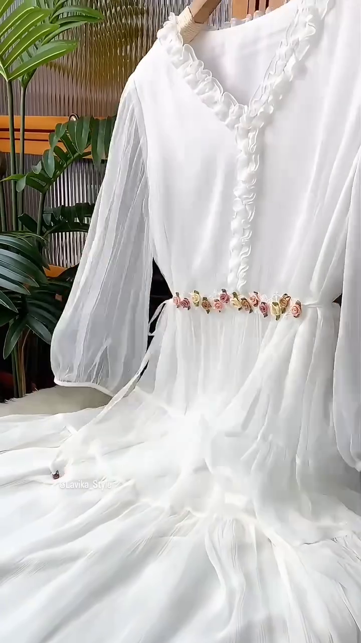 Flowing elegance wrapped in white serenity