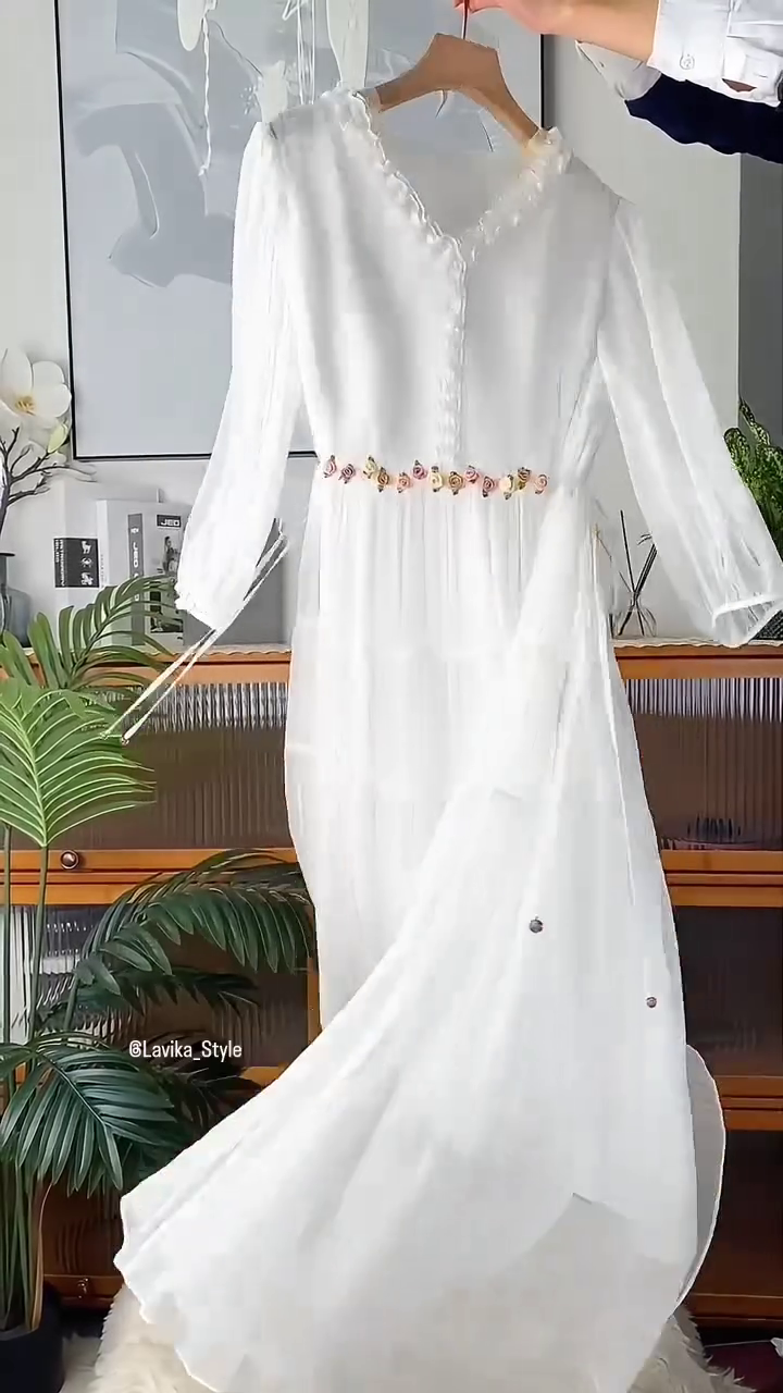 Flowing elegance wrapped in white serenity - Image 3